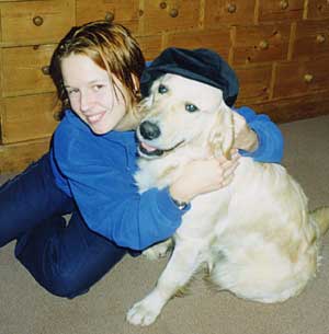 Golden retriever Magic looking very spendid in Marie's hat